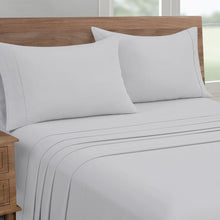Microfiber sheet set with solid white fitted sheet and two matching pillowcases