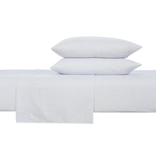 White microfiber sheet set with diamond pattern; pillows and top sheet shown