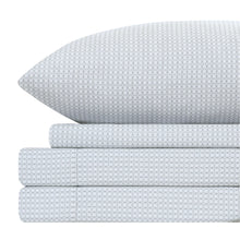Folded microfiber sheets in white with textured diamond pattern