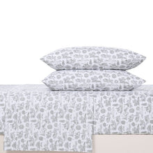 Microfiber sheet set components stacked: white fabric with gray small-town print