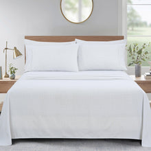 White microfiber sheet set with diamond pattern; pillowcases and flat sheet visible