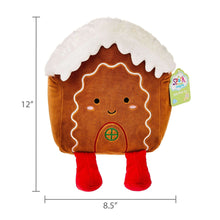 Plush gingerbread house baby toy, brown with white roof, happy face, red feet