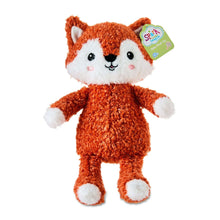 Orange fox plush toy with white muzzle and paws, soft curly fur, small hang tag
