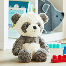 Sitting panda plush with gray-and-white fur, round eyes, and padded feet