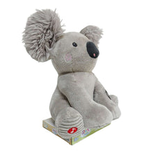 Grey koala plush toy posed sideways with one paw raised and soft fuzzy ears.