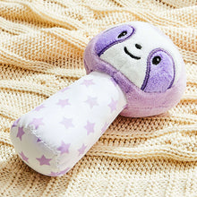 Plush sloth hand-grip rattle close-up, white sleeve with lilac stars and smiling face