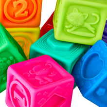Close-up of colorful numbered sensory stacking vinyl blocks with embossed animal and shape details