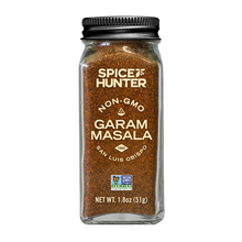 Garam masala seasoning blend glass jar with black lid and front label
