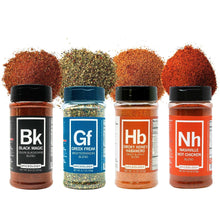 4 spice seasoning bottles with colorful lids and blends, labeled Bk, Gf, Hb, Nh