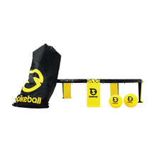 Spikeball net with black carry bag and yellow balls