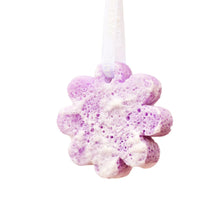 Purple flower-shaped bath sponge with hanging white loop