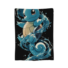 Black flannel throw blanket with blue turtle character and teal splash graphic