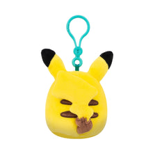 Clip-on Pikachu plush keychain, yellow with brown mouth detail, teal clip