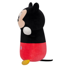 Mickey Mouse plush toy, side profile, black ears and shirt, red shorts and yellow feet
