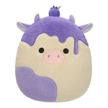 Purple and cream cow plush toy with pink snout, black eyes, and fuzzy texture.
