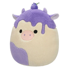 Purple and cream cow plush toy with pink snout, black eyes, and horn tuft on top.