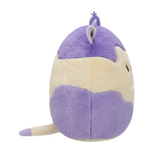 Purple and cream cow plush toy in side view with pointed ear and fuzzy tail.
