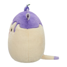 Purple and cream cow plush toy with fuzzy tail and small horn tuft, side view.