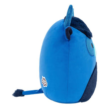 Blue highland cow plush side view with small smiling face and dark navy horns.