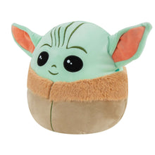 Mint and tan Grogu plush with orange inner ears, black eyes, and forehead stripe detailing