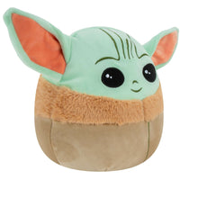 Mint Grogu plush with tan body, orange inner ears, and long forehead stripes