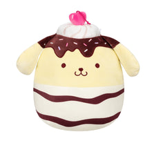 Brown and cream pudding-themed stuffed plush with pink bow and smiling face