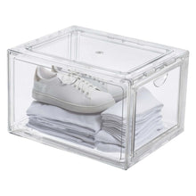 Stackable clear shoe organizer with white sneakers and folded socks on shelves