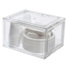 Stackable clear shoe organizer with stacked shoe liners and socks