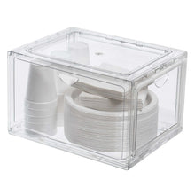 Clear stackable shoebox organizer with stacked folded fabric inside
