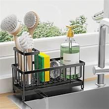Kitchen sink caddy with sponge holder, brush cups, and soap bottle organizer