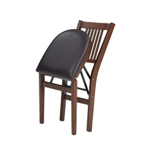 Wood folding chair in side view with dark padded seat and slatted backrest