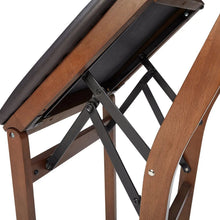 Wood folding chair frame with black support hardware under the dark seat cushion
