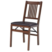Wood folding chair with dark gray padded seat and slatted backrest