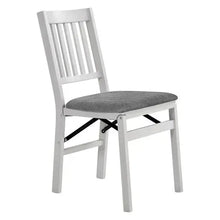 Light wood folding upholstered chair with gray padded seat and slatted back