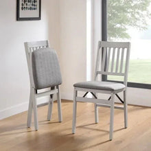Gray fabric upholstered folding chair with slatted back, shown in a 2-pack pair