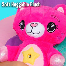 Pink plush cat night light close-up with smiling face and glowing belly star