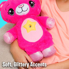 Pink huggable plush cat night light with glowing star on belly