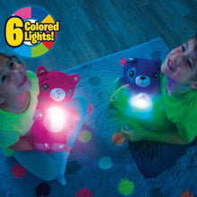 Blue, pink, and green plush puppy night lights with glowing star bellies.