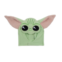 Plush green Grogu hat with long ears and large black-and-white eyes