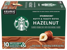 Hazelnut flavored coffee K-Cup pod box front, green with Starbucks logo and hazelnut