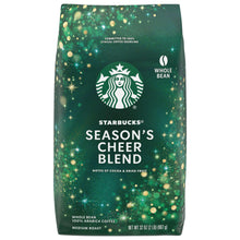 Green coffee bag with Starbucks logo and whole bean medium roast label