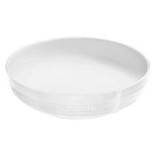 Staub white serving bowl with wide rim and embossed STAUB logo on base