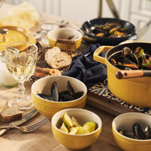 Yellow stoneware bowls, set of 2, glossy glaze with embossed STAUB