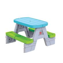 Step2 picnic table with blue tabletop and green fold-out seats