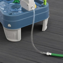 Water play center hose with green connector and blue pump housing