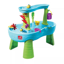 Blue-and-green splash water table with multiple toy figures and a hanging bucket