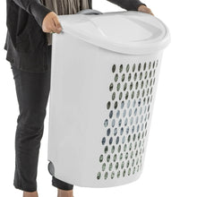 White plastic wheeled laundry hamper with vented side holes, carried by handle