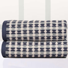 Bath towel set with small check pattern, navy and white folded
