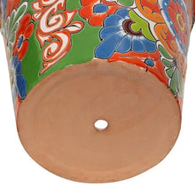 Ceramic planter base with circular drainage hole and multicolor Talavera painted exterior