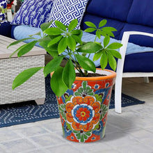 Multicolor ceramic Talavera planter with orange rim and floral geometric pattern